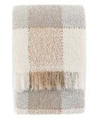 Textured blanket with plaid pattern on a white background