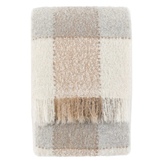 Textured blanket with plaid pattern on a white background