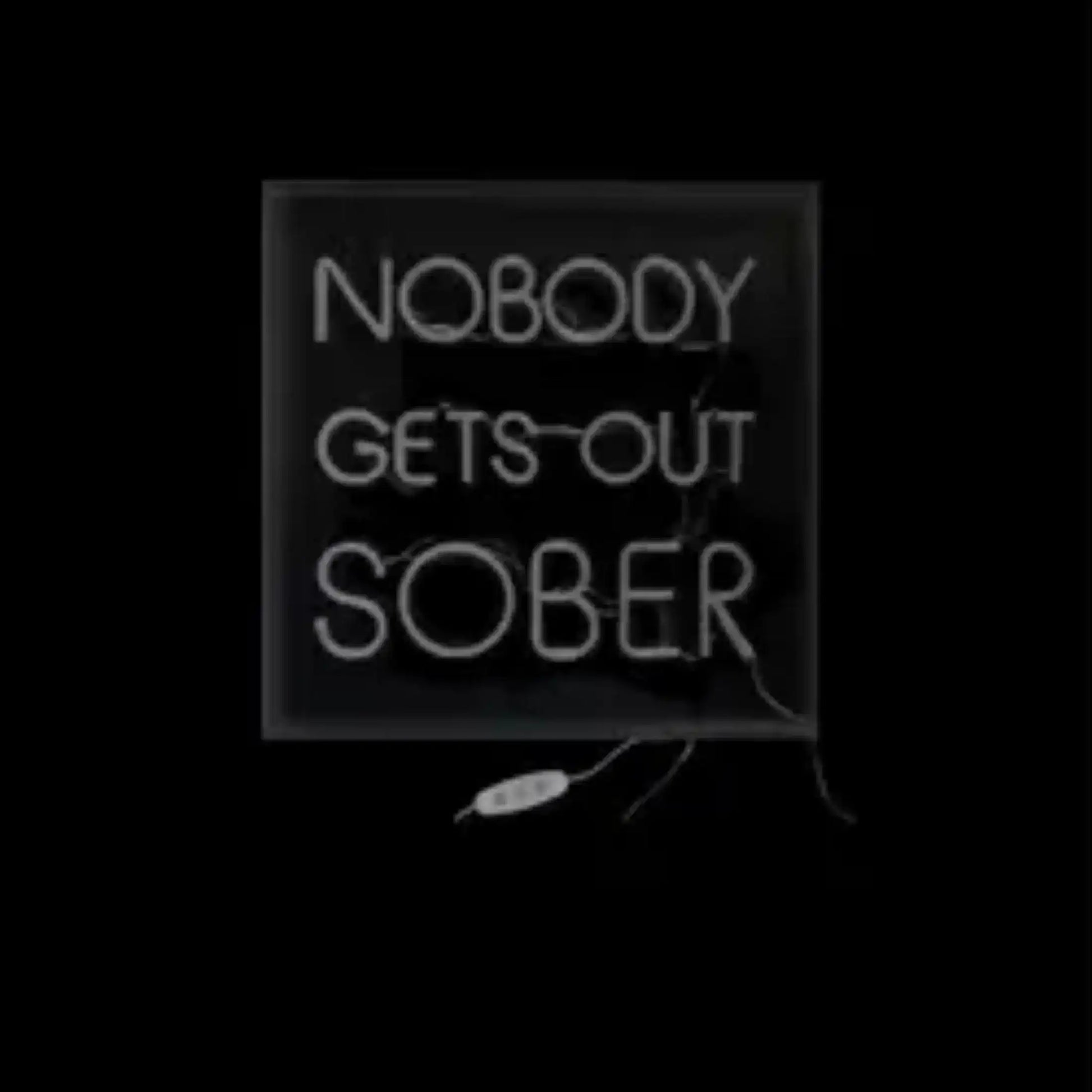 Neon sign with 'Nobody Gets Out Sober' text on a black background