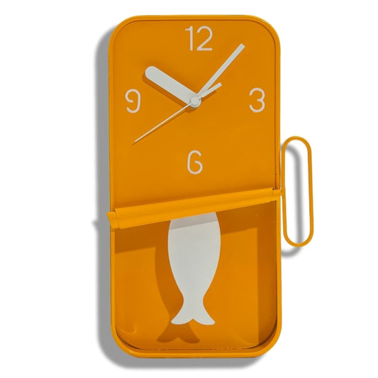 Orange wall clock with fish design on a white background