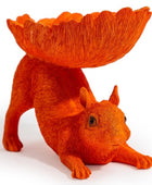 Orange squirrel-shaped bowl on a white background