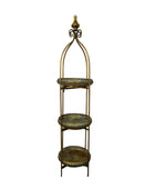 Decorative three-tiered metal stand against a plain background