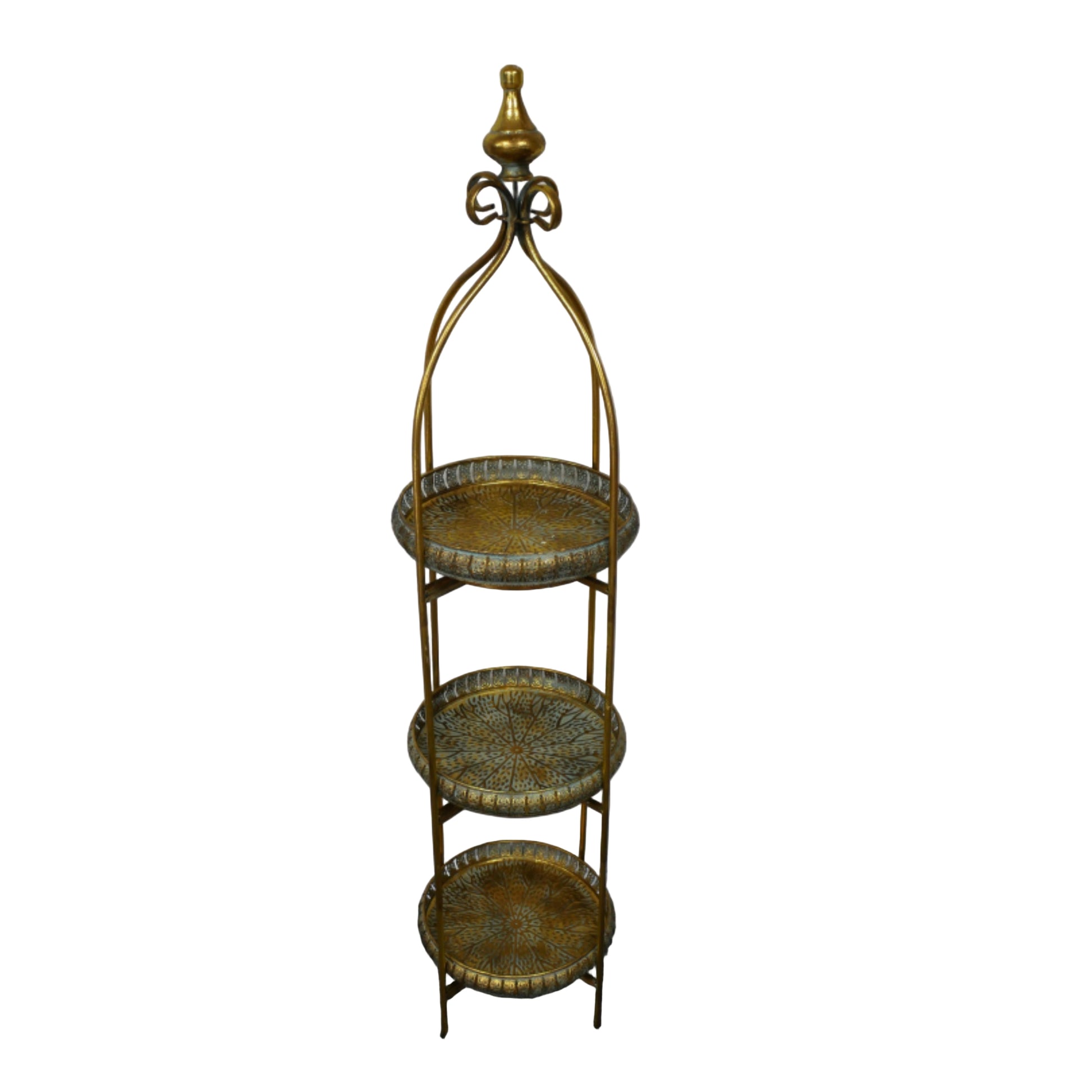 Decorative metal shelf with three tiers against a plain wall.