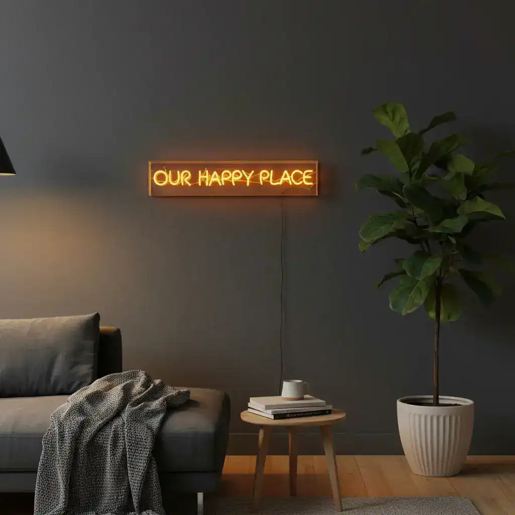 Neon sign with 'OUR HAPPY PLACE' text on a black background