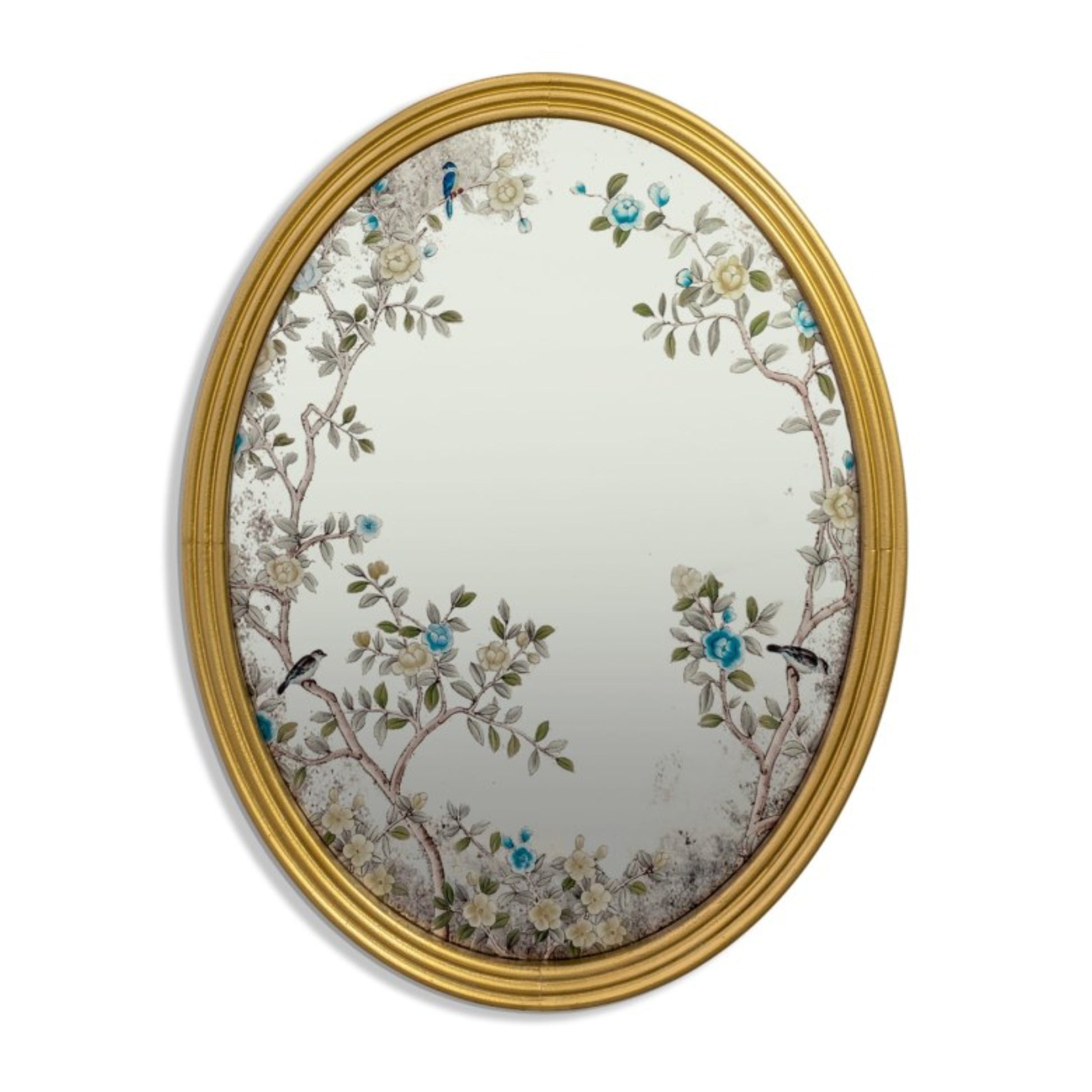 Decorative oval mirror with floral and bird design in a gold frame on a white background