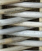 Close-up of a stack of wooden pallets with metal cables.