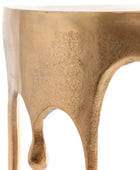 Close-up of a textured gold stool on a white background