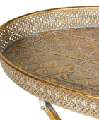 Decorative round table with intricate gold pattern on a white background