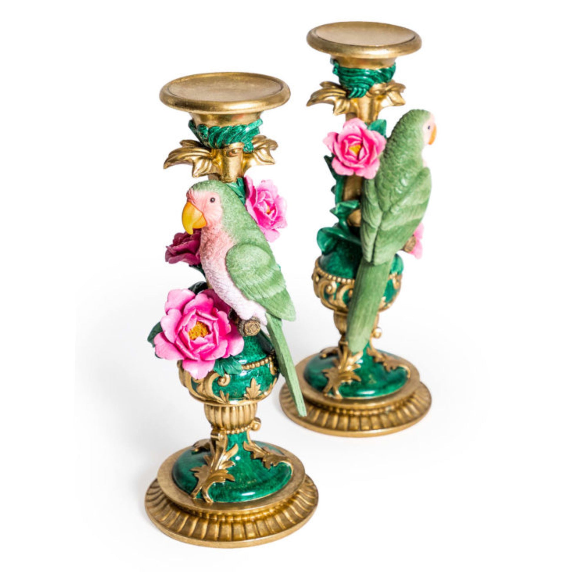 Decorative candle holders with parrot and rose design on a white background