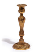 Decorative gold candlestick on a white background