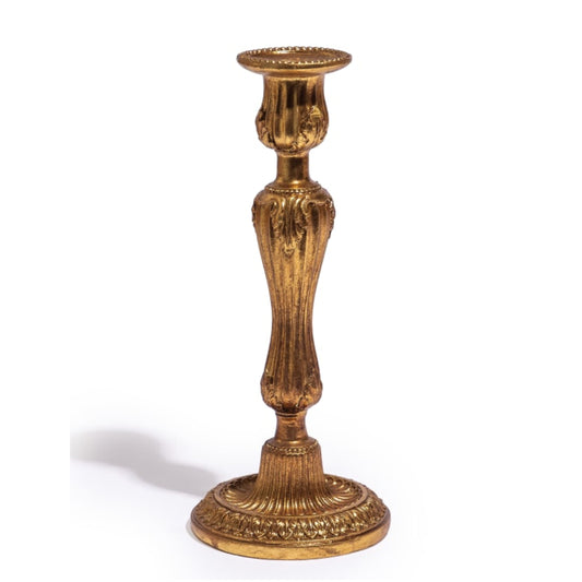 Decorative gold candlestick on a white background