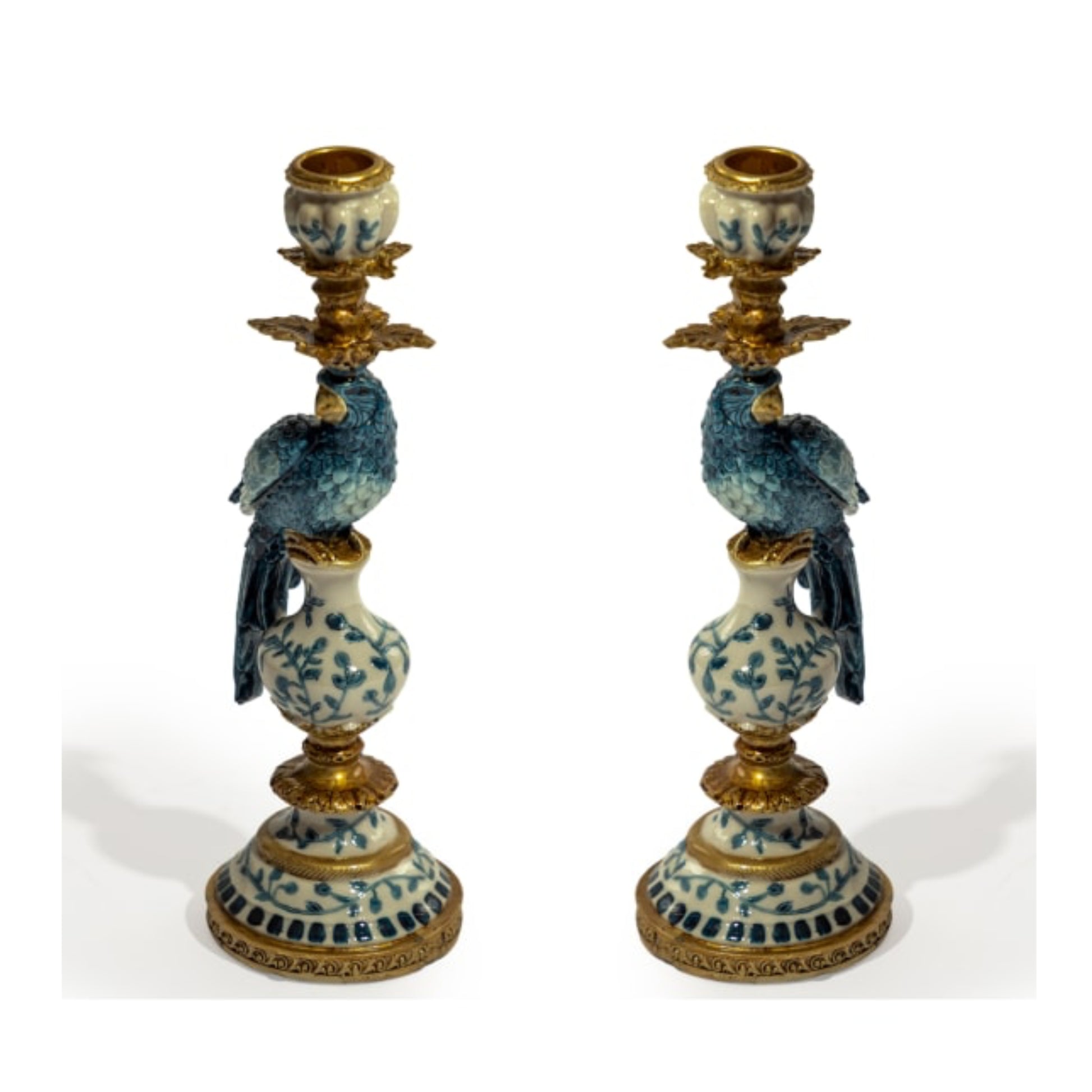 Pair of decorative candle holders with blue and white designs on a white background