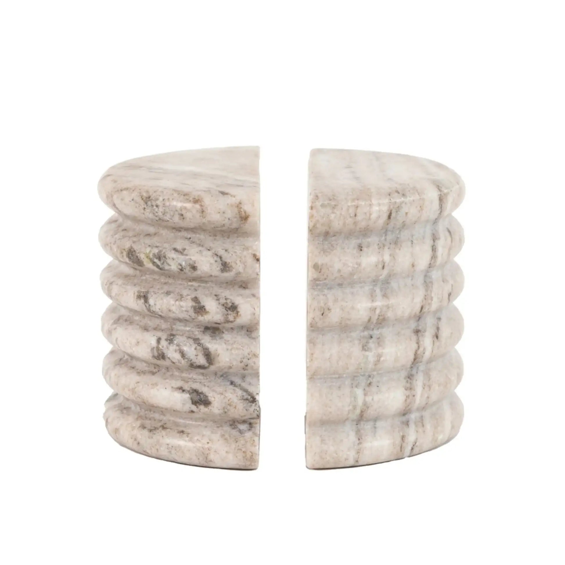 Marble-textured cylindrical bookends on a white background