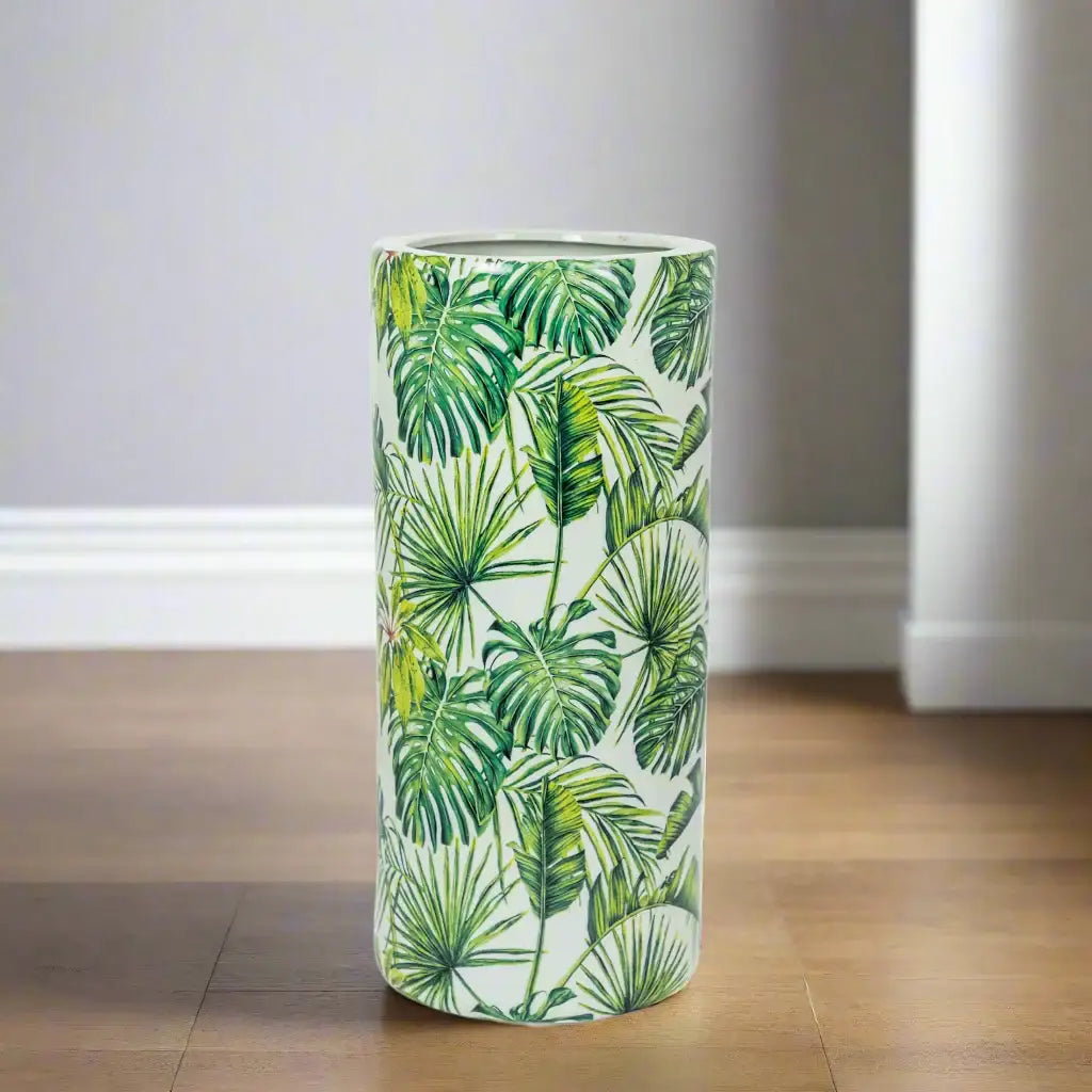 Tumbler with tropical leaf pattern on a white background
