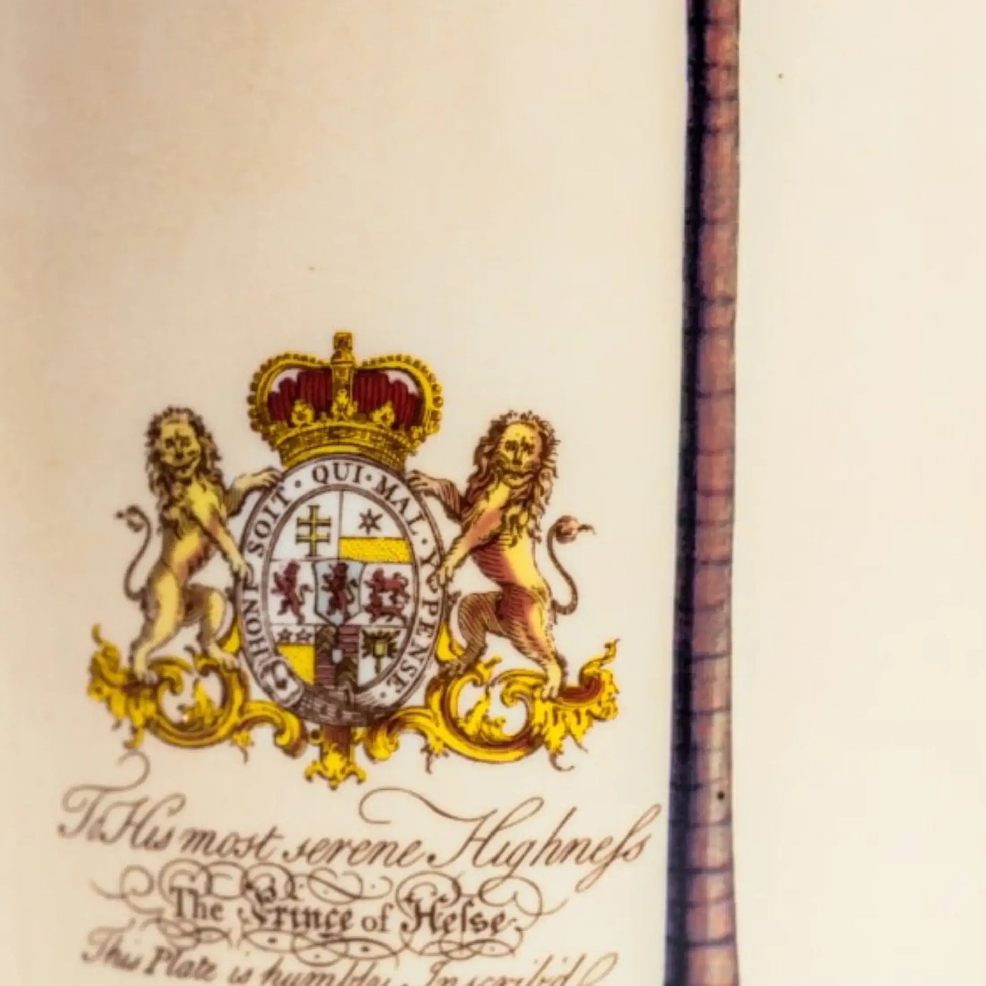 Coat of arms with lions and a crown on a beige background