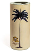 Umbrella stand with palm tree design and emblem on a beige background