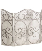 Decorative metal screen with intricate designs on a white background