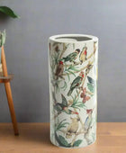 Tumbler with bird design on a white background