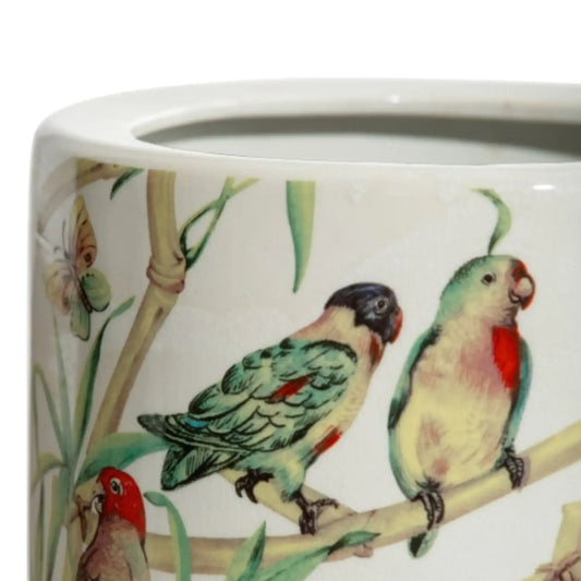 Ceramic mug with parrot design on a white background