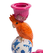 Decorative candle holder shaped like a parrot with a pink top on a white background