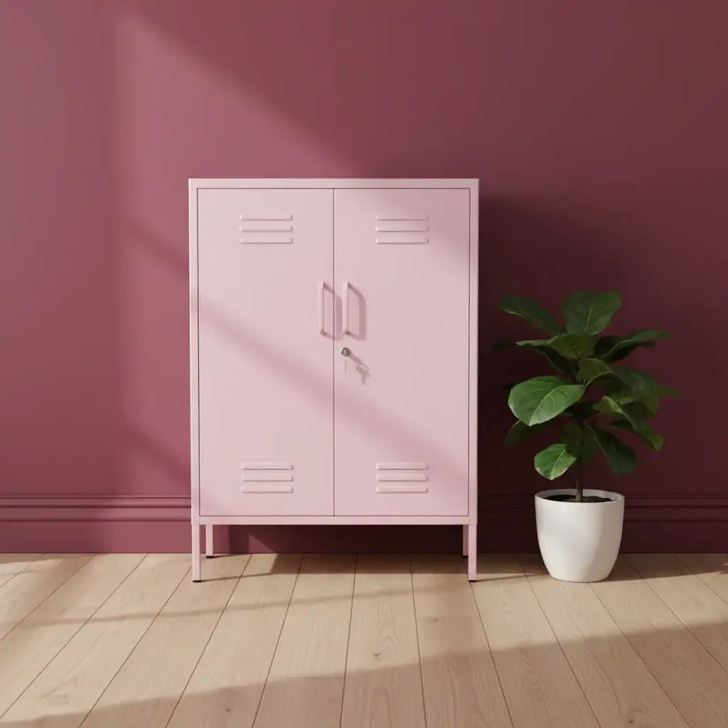 Pink metal locker against a maroon wall with a potted plant on a wooden floor.