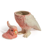Parrot-shaped planter on a white background