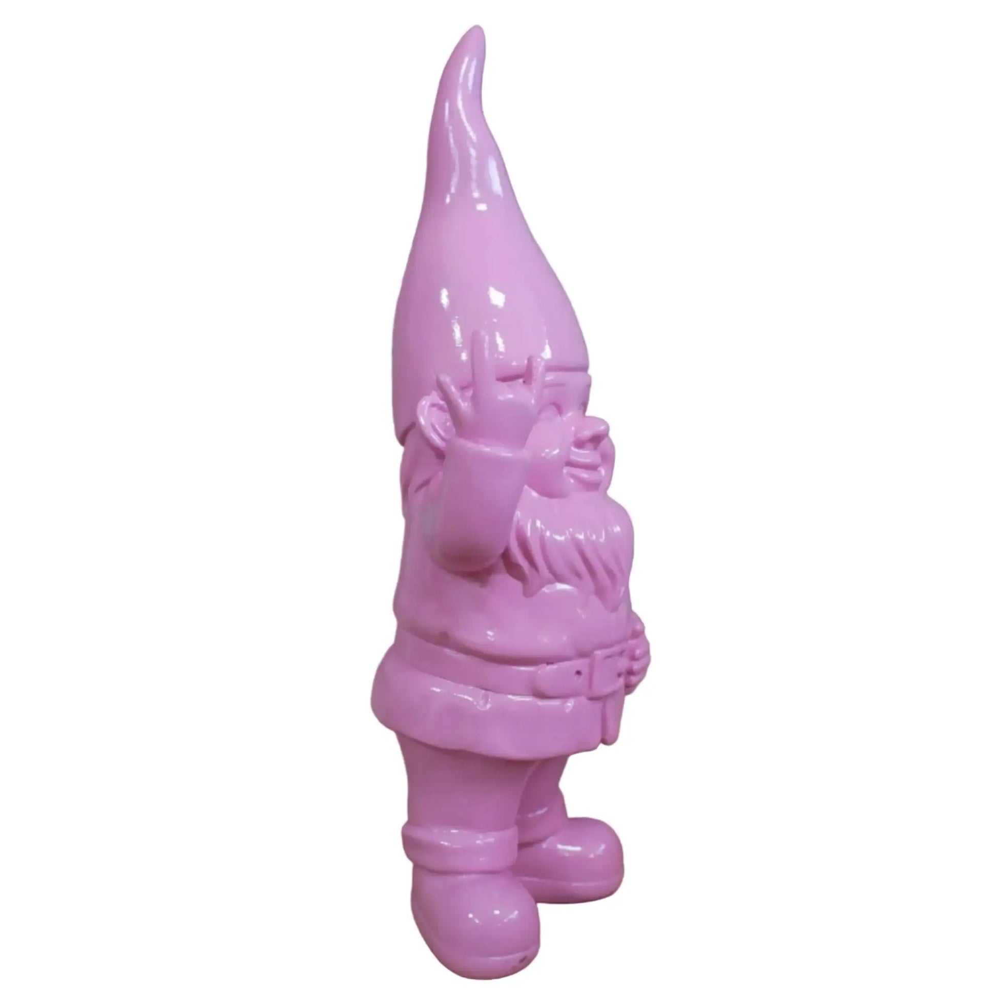 Pink garden gnome against a stone wall background