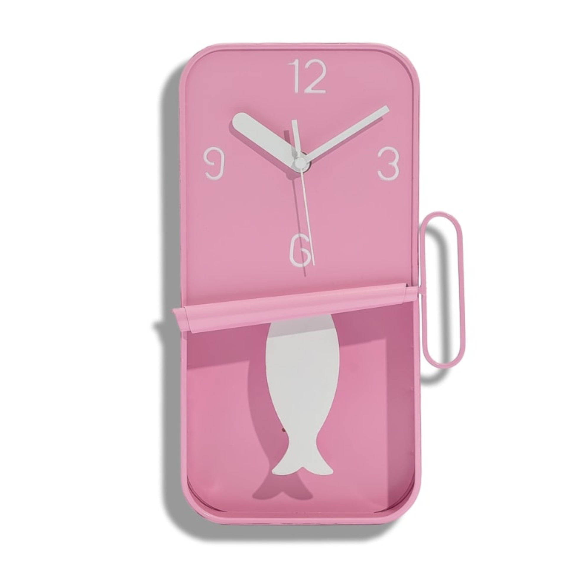 Pink wall clock with fish design on a white background
