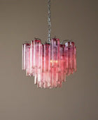 Pink and purple glass chandelier on a white background