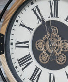 Wall clock with mechanical gear design and Roman numerals on a white face.