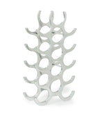 Silver wine rack with leaf-like design on a white background