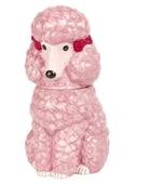 Pink poodle-shaped cookie jar with a red bow on a white background