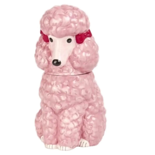 Pink poodle-shaped cookie jar with a red bow on a white background