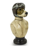Decorative dog figurine wearing a vintage pilot helmet on a white background