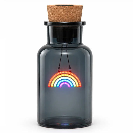 A dark gray glass bottle with a cork stopper and a black neck collar, featuring a hanging LED rainbow light inside. The bottle is centered on a clean white background.