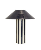 Black and white striped table lamp on a white background