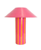 Colorful striped lamp with a pink shade on a white background