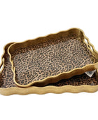 Leopard print tray with gold rim on a white background