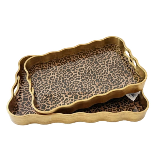 Leopard print tray with gold rim on a white background