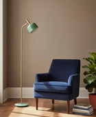Green floor lamp with a white background