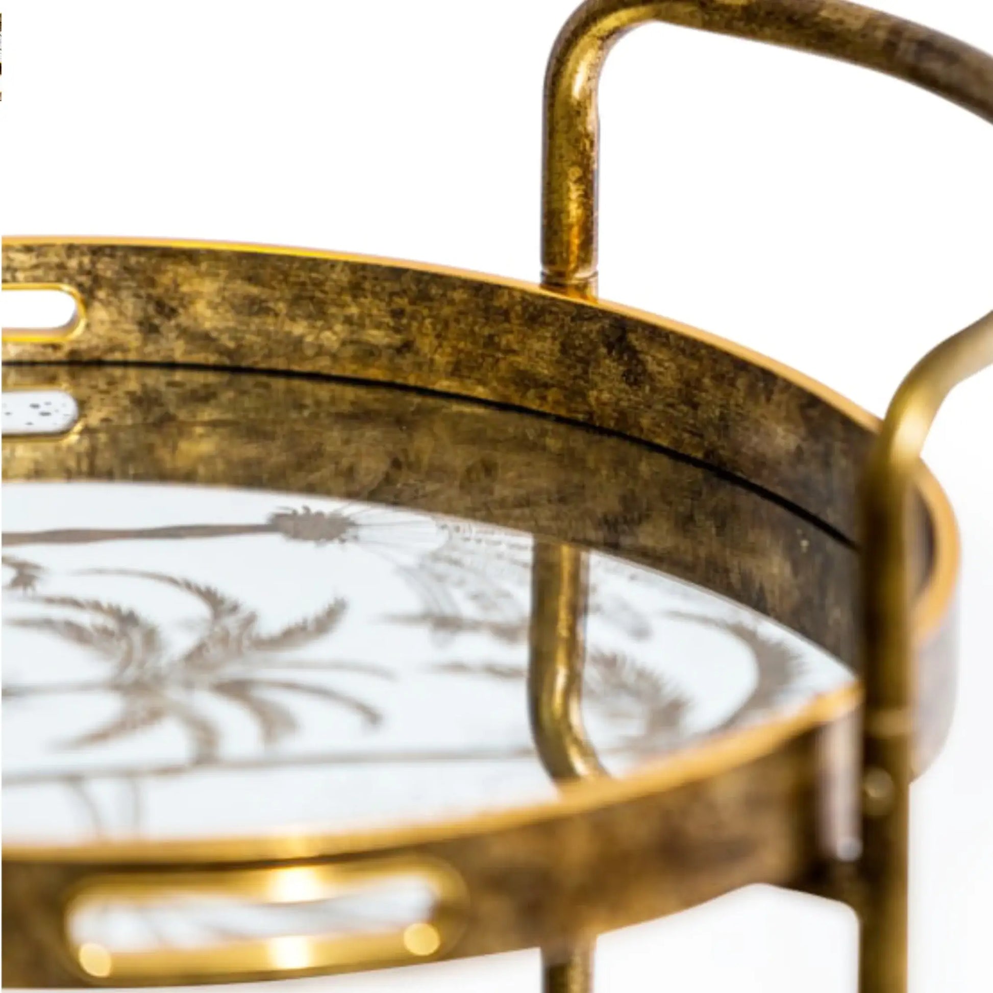 Gold round tray with handles on a white background