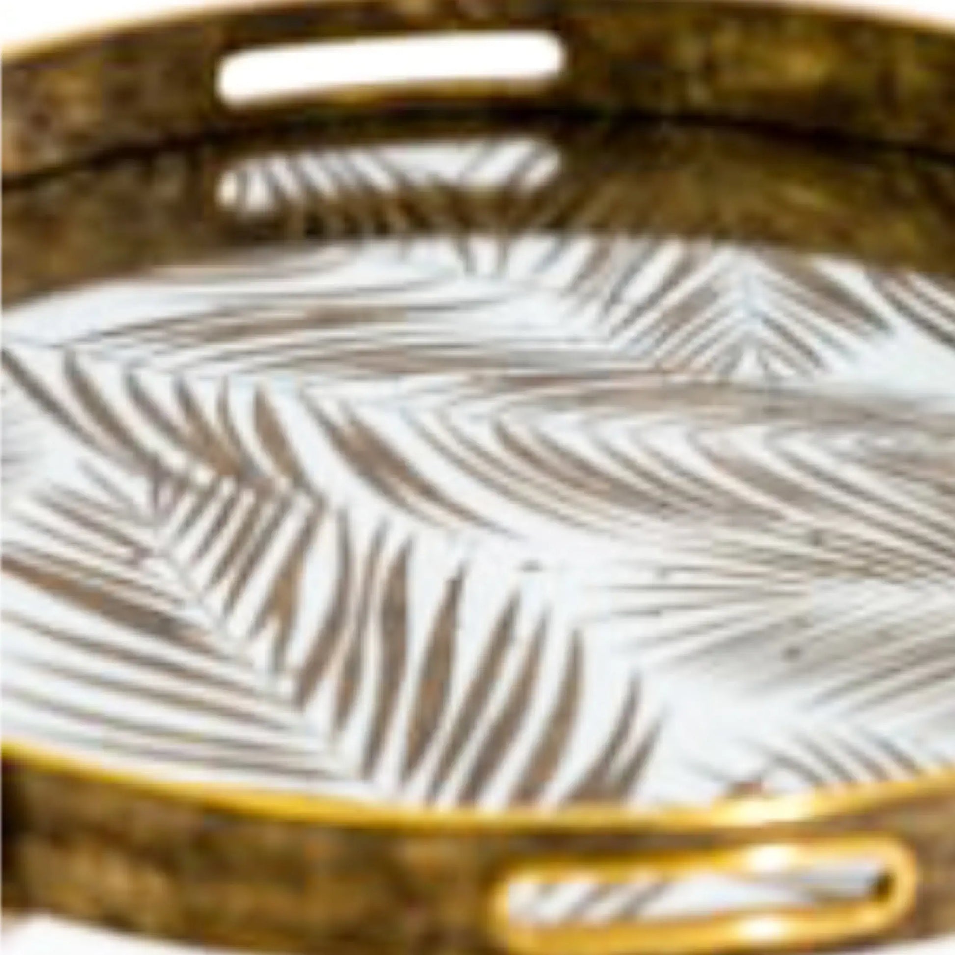 Decorative tray with gold rim and leaf pattern