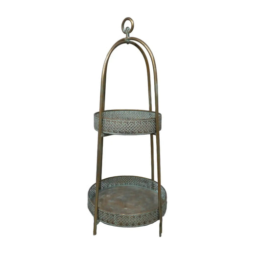 Two-tiered metal stand with decorative patterns on a white background