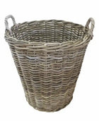 Wicker laundry basket with handles on a white background