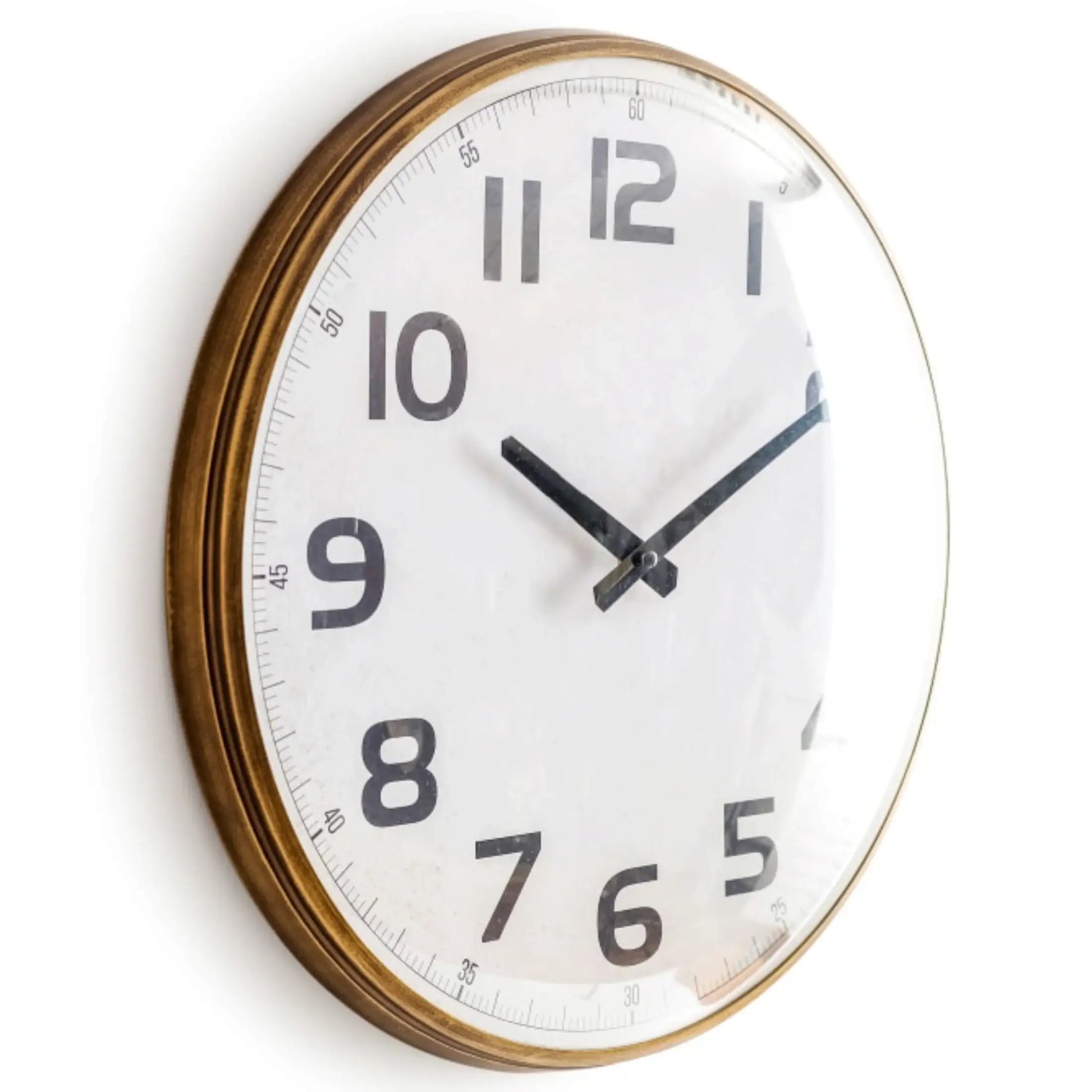 Wall clock with a white face and black numbers on a white background