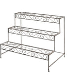 Wrought iron plant stand with decorative scrollwork on a white background