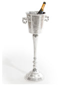 Silver wine cooler with a bottle of champagne on a white background
