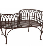 A dark brown metal garden bench with a curved, lattice-style backrest and a slatted seat, shown against a plain white background.