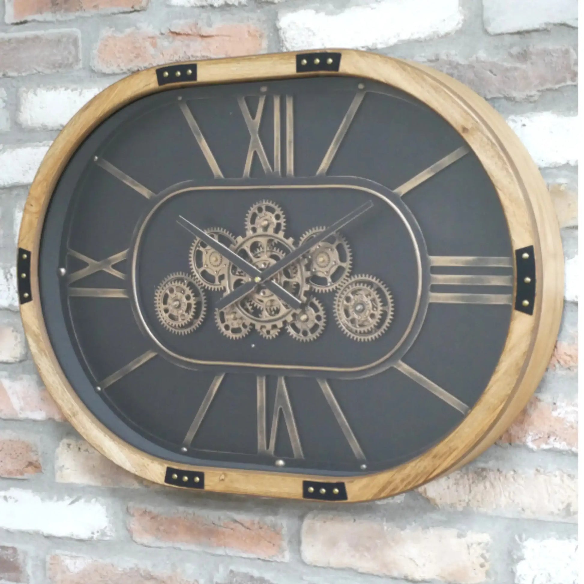 Decorative wall clock with gear design on a brick wall