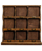 A rustic 9-compartment wooden display cabinet with a three-by-three grid of drawers, featuring dark brown wood grain and small brass pull handles, isolated on a white background.